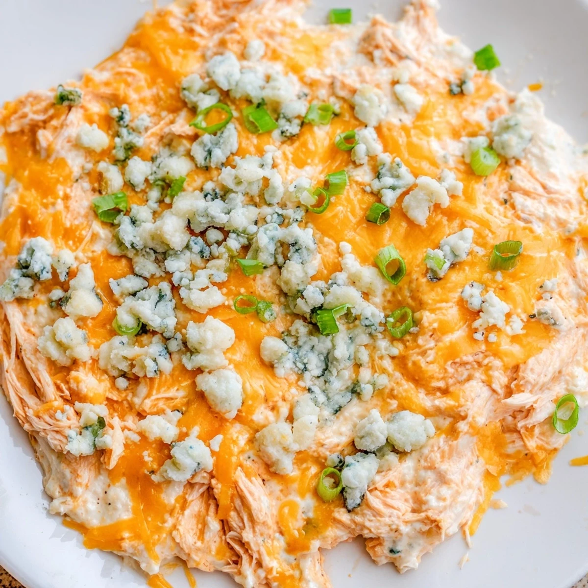 Hot Keto Buffalo Chicken Dip served with celery sticks, a low carb appetizer perfect for American football gatherings.