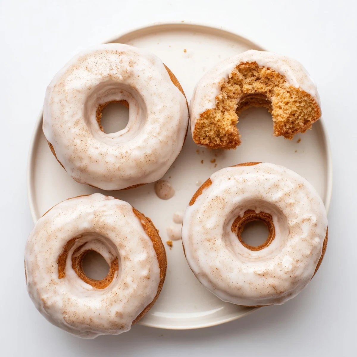 Light and moist Greek yogurt cake donuts dipped in white glaze, ready to serve