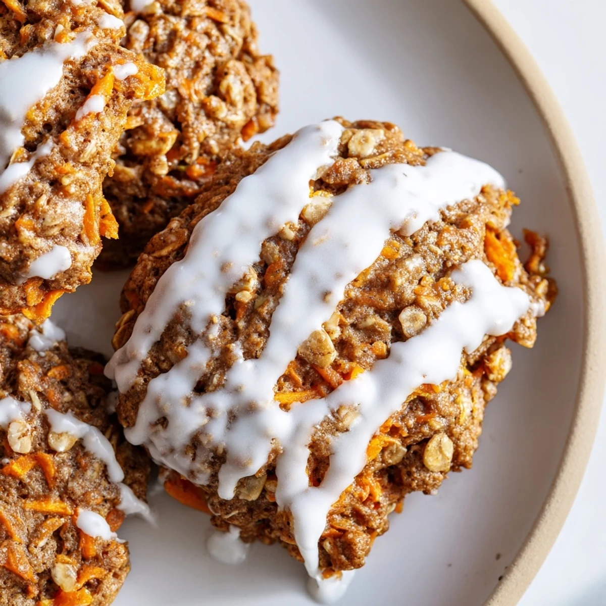 Chewy carrot cake cookies loaded with grated carrots and warm spices close-up