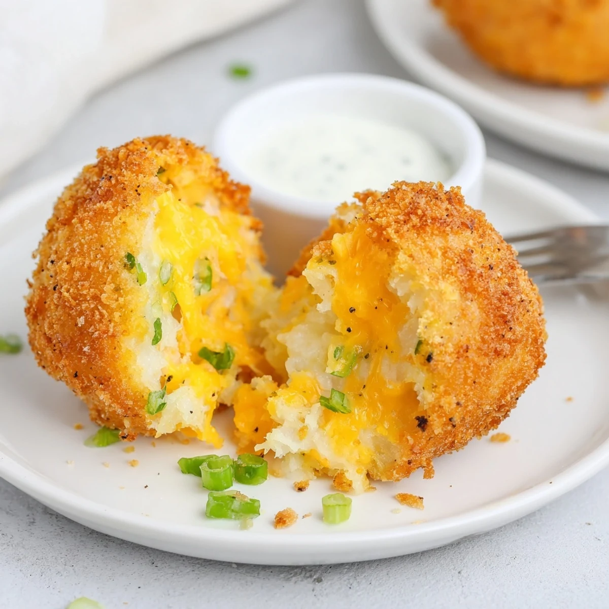 Fried Mashed Potato Balls served hot with tangy ranch dip and herbs