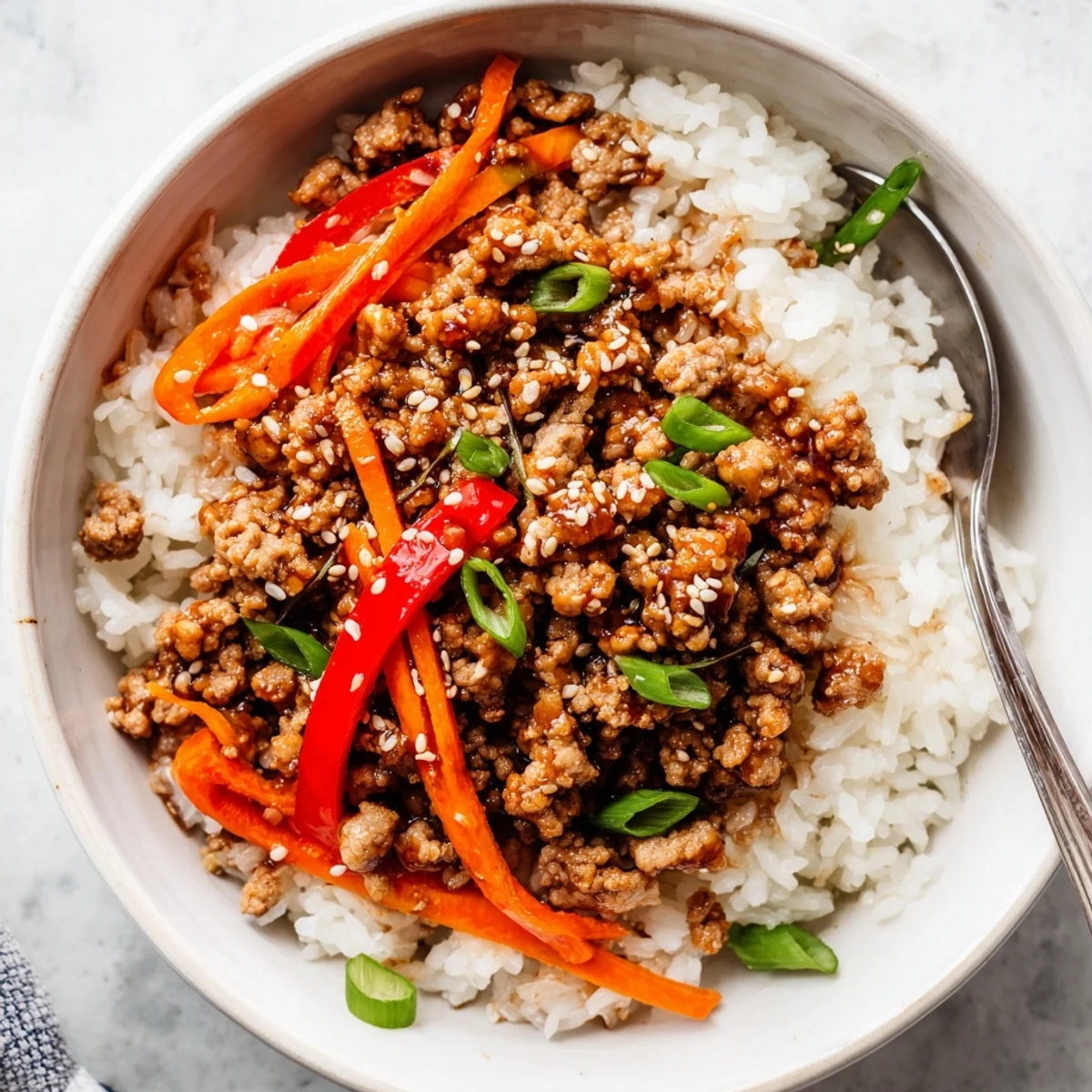 Teriyaki Turkey Rice Bowls with glossy sesame glaze, steaming rice and crisp vegetables