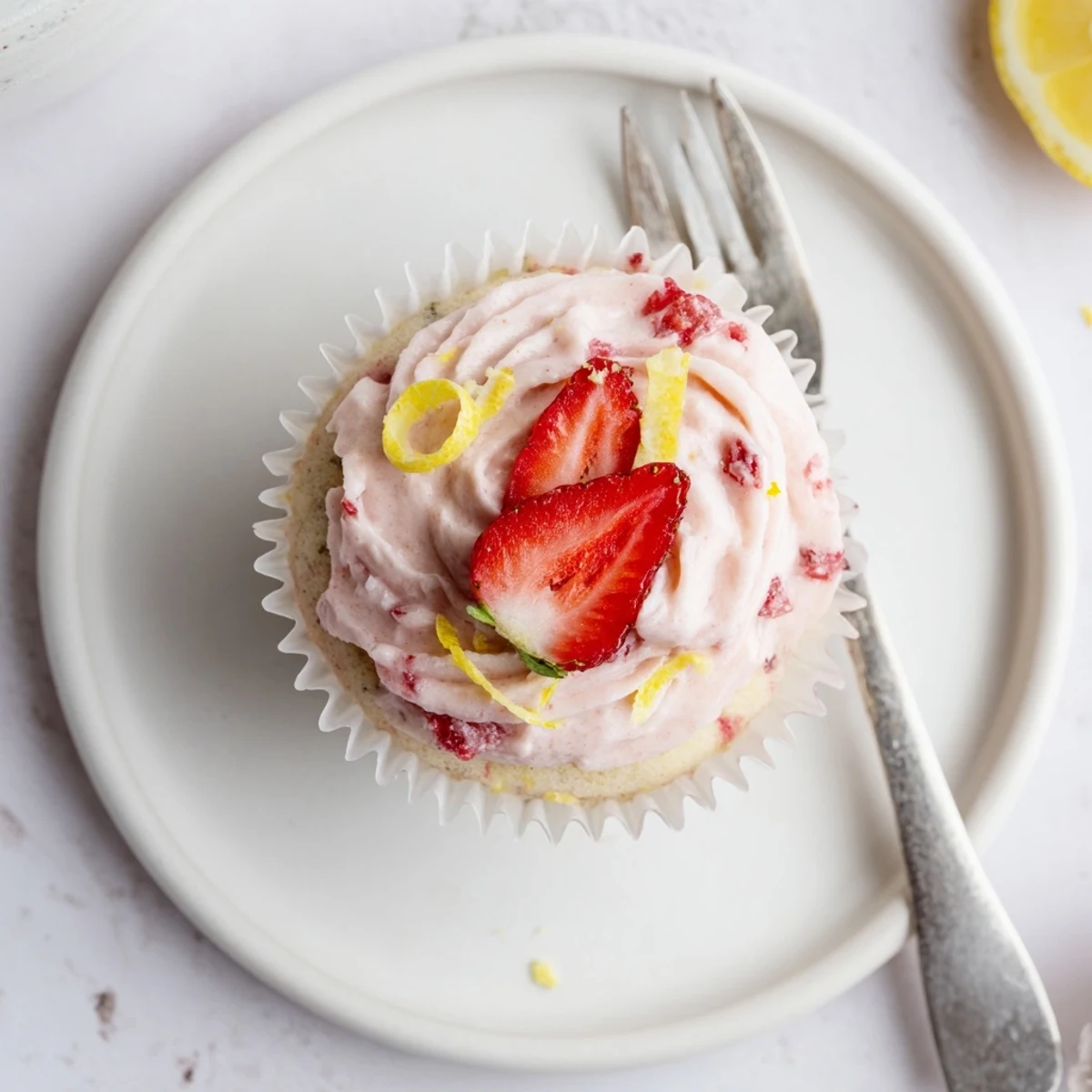 Strawberry Lemonade Cupcakes with fluffy buttercream, bright citrus aroma, summer picnic-ready