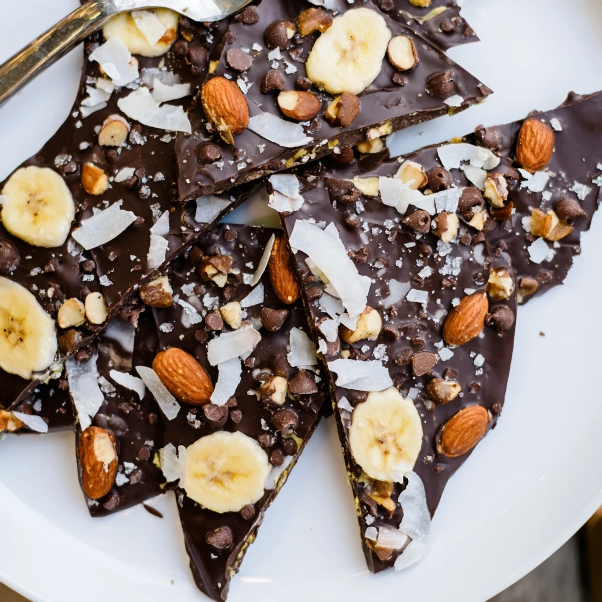 Rich chocolate banana bark broken into rustic shards dusted with shredded coconut